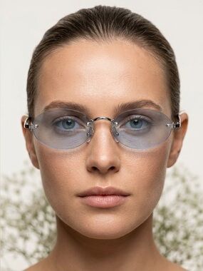 House of Harlow Rimless Oval Blue Lens Women's Sunglasses